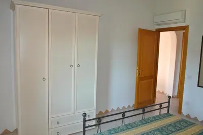 Letto o letti in una camera di Residence Le Zagare