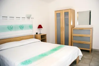 Letto o letti in una camera di Casa ARCU DE CHELU
