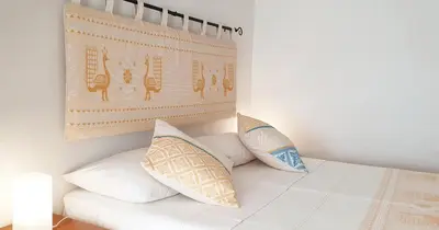 Letto o letti in una camera di Affittacamere Le Ginestre