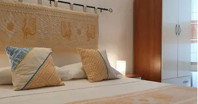Letto o letti in una camera di Affittacamere Le Ginestre