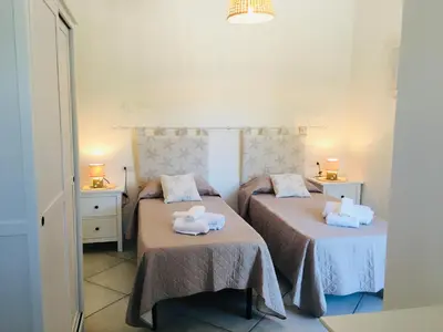Letto o letti in una camera di Beach House Ilaria - Turchese Apt