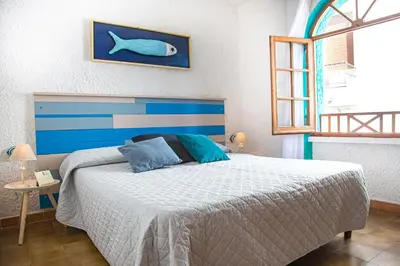 Letto o letti in una camera di Ti porto al mare Apartment IUN P7641