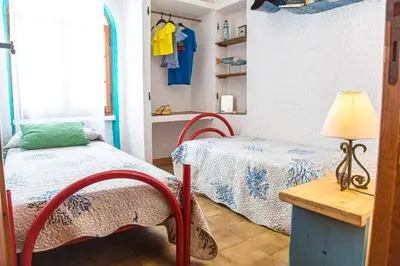 Letto o letti in una camera di Ti porto al mare Apartment IUN P7641