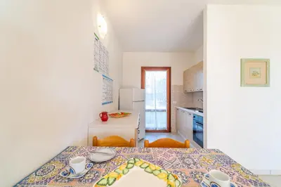 Letto o letti in una camera di ISS Travel, L'Uddastru Panoramic Apartments - with private outdoor terrace