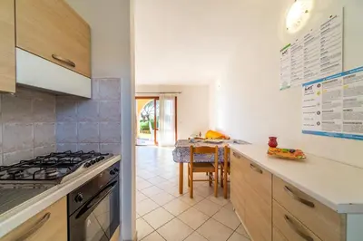 Cucina o angolo cottura di ISS Travel, L'Uddastru Panoramic Apartments - with private outdoor terrace