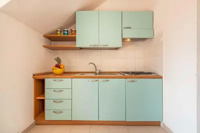 Cucina o angolo cottura di Apartment in San Teodoro 23144