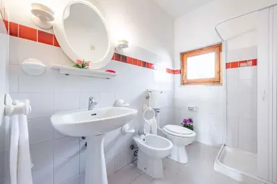 Bagno di Apartment in San Teodoro 23144