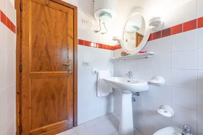 Bagno di Apartment in San Teodoro 23144