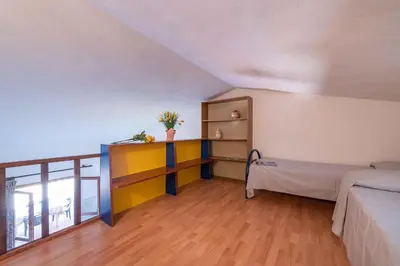 Letto o letti in una camera di Apartment in San Teodoro 23143