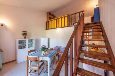 Area soggiorno di Apartment in San Teodoro 23143