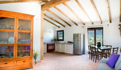Cucina o angolo cottura di Case Vacanze S'Arrexina