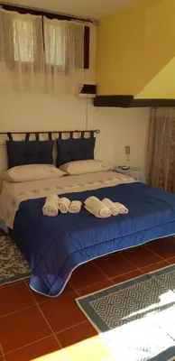 Letto o letti in una camera di Monolocale indipendente con giardino