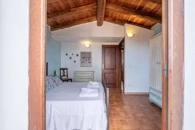 Letto o letti in una camera di CASABELLAVISTA