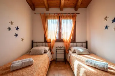 Letto o letti in una camera di CASABELLAVISTA