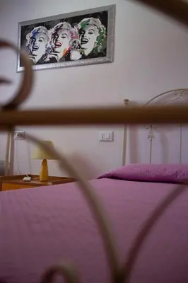 Letto o letti in una camera di Risacca