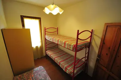 Letto o letti in una camera di RESIDENZA I MELOGRANI