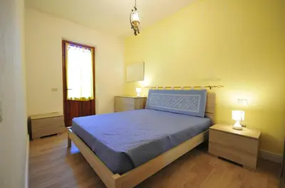 Letto o letti in una camera di RESIDENZA I MELOGRANI