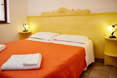 Letto o letti in una camera di Appartamento Fresia