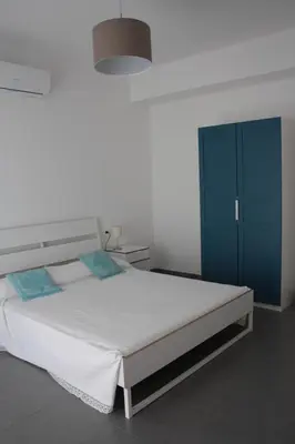 Letto o letti in una camera di Gli olivi