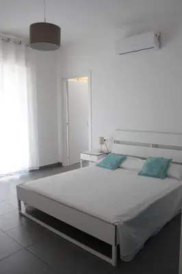 Letto o letti in una camera di Gli olivi