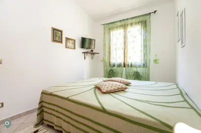 Letto o letti in una camera di Villino Bordeaux