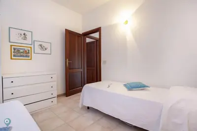 Letto o letti in una camera di Villino Funtana