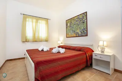 Letto o letti in una camera di Villino Funtana Bilo