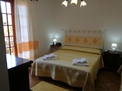 Letto o letti in una camera di Carpe Diem