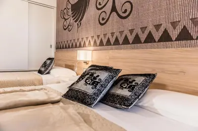 Letto o letti in una camera di Relais del Borgo- Domo