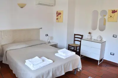 Letto o letti in una camera di Sardegna23 - Appartamento Vacanze -