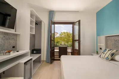 Letto o letti in una camera di Hotel Ristorante La Conchiglia