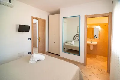 Letto o letti in una camera di Le Dune