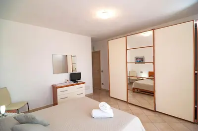 Letto o letti in una camera di Le Dune