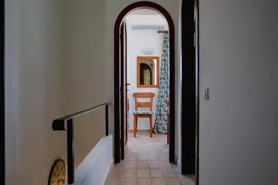 Letto o letti in una camera di Isola Alta - BUDONI SWEET HOME