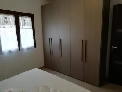 Letto o letti in una camera di B&B Nino