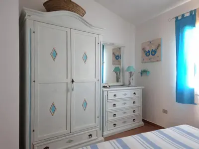 Letto o letti in una camera di LA COLLINETTA