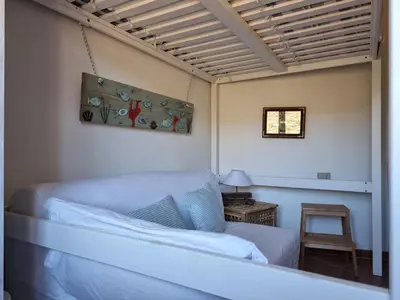 Letto o letti in una camera di LA COLLINETTA