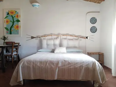 Letto o letti in una camera di La Casetta
