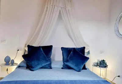 Letto o letti in una camera di Stazzo San Teodoro Piscina Condivisa
