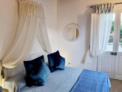 Letto o letti in una camera di Stazzo San Teodoro Piscina Condivisa