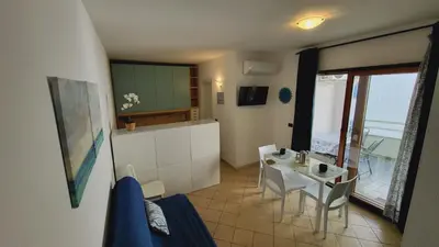 TV o dispositivi per l'intrattenimento presso Le Residenze Blu Sardinia
