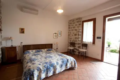 Letto o letti in una camera di Agriturismo Testone
