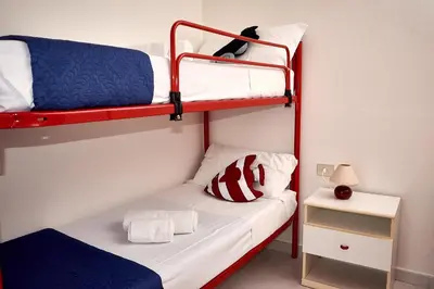 Letto o letti in una camera di La Meridiana IUN P2300