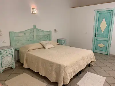 Letto o letti in una camera di Canne al Vento