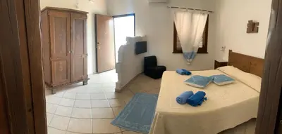 Letto o letti in una camera di Canne al Vento