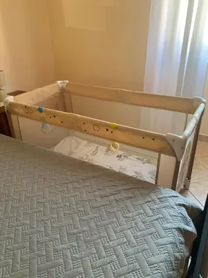 Letto o letti in una camera di Casa Olbia