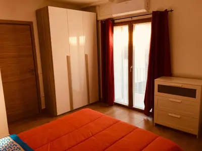 Letto o letti in una camera di CAV Mameli