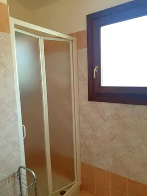 Bagno di Residence Le Ginestre / Ataras
