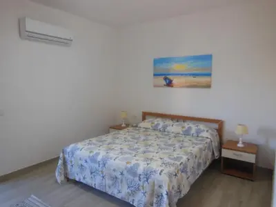 Letto o letti in una camera di PUNTO ZERO ROOMS