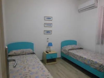 Letto o letti in una camera di PUNTO ZERO ROOMS